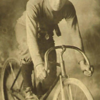 Isador Golden on racing bike